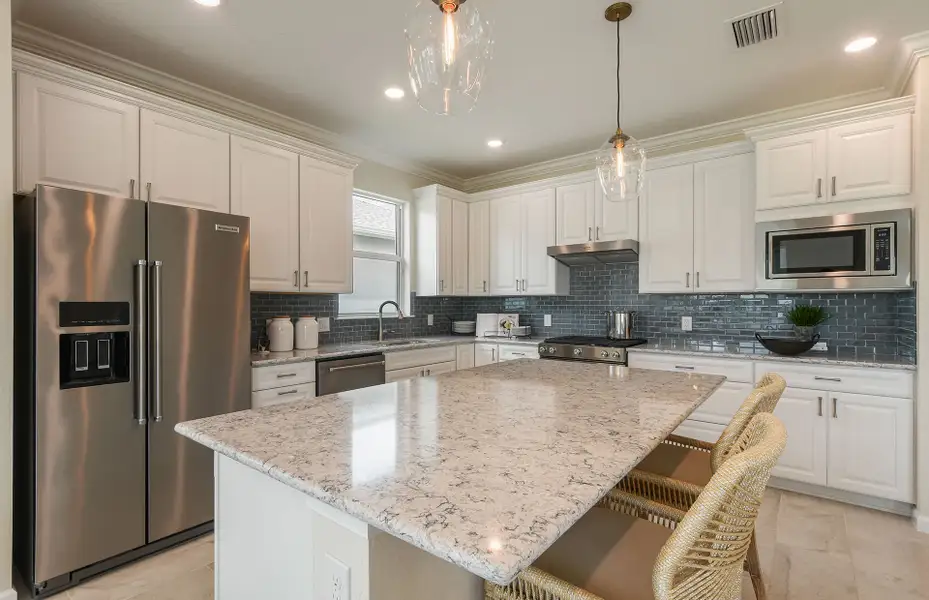Furnished interior view inside a new home in Emerson Oaks, Vero Beach (Image 3).