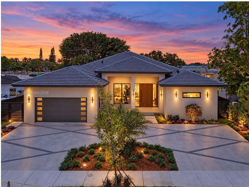 Front exterior of a new home in , Miami, FL, highlighting curb appeal (Image 28). Front exterior of a new home in , Miami, FL, highlighting curb appeal (Image 28).