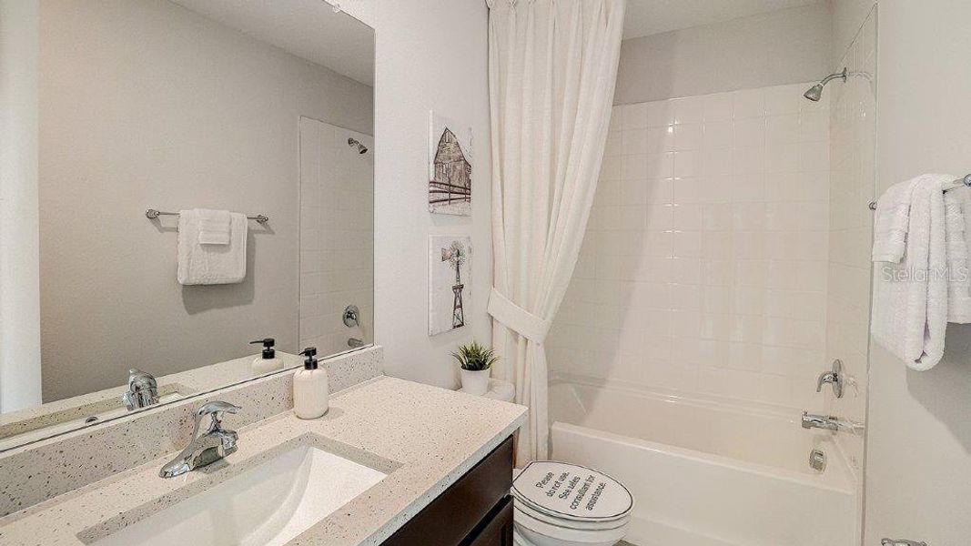 Furnished interior view inside a new home in Towns at Woodsdale, Wesley Chapel (Image 11). Furnished interior view inside a new home in Towns at Woodsdale, Wesley Chapel (Image 11).