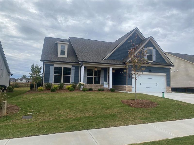 Front exterior of a new home in , Jefferson, GA, highlighting curb appeal (Image 1).