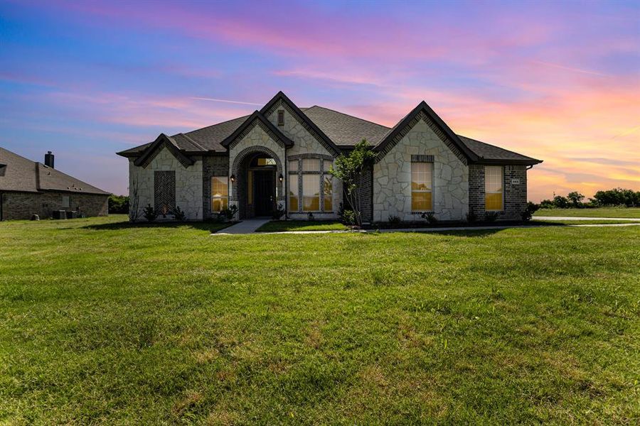 Front exterior of a new home in , Waxahachie, TX, highlighting curb appeal (Image 21).