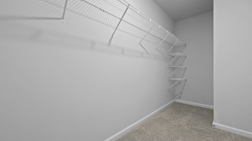 Representative unfurnished interior of a home built from the Aisle by D.R. Horton in Pine Hills at Cane Bay, Summerville (Image 32).