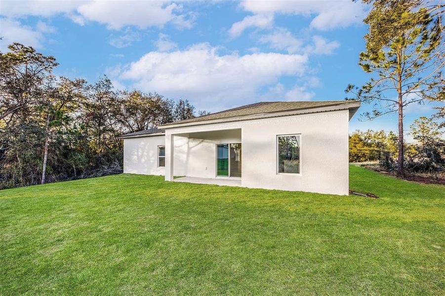 Exterior details and patio area of a home in Poinciana, Poinciana (Image 2). Exterior details and patio area of a home in Poinciana, Poinciana (Image 2).