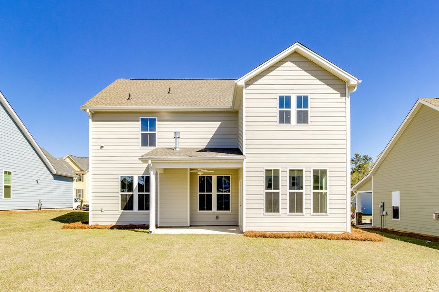 Exterior details and patio area of a home in Pebble Branch, Chapin (Image 26).