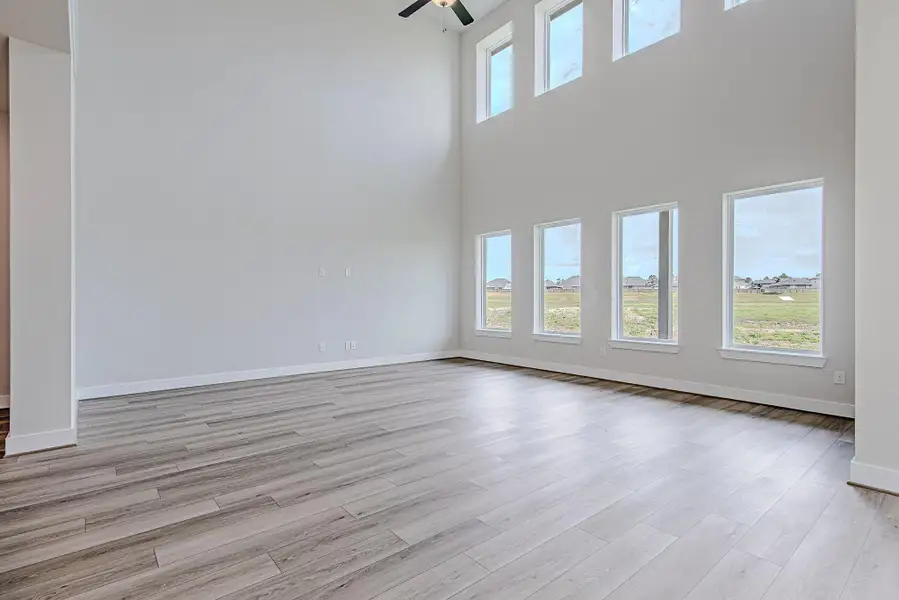 Expansive living area with large windows that bring in abundant natural light.