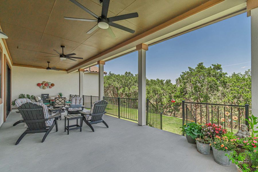 View of patio with a ceiling fan and outdoor lounge area