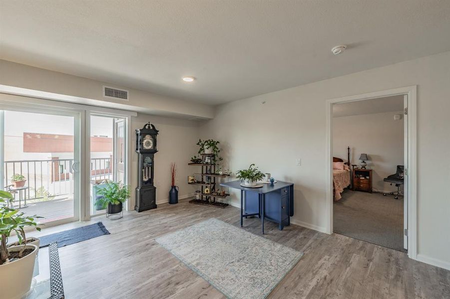 Dining area with inviting sliding door that leads out to your own outdoor retreat.