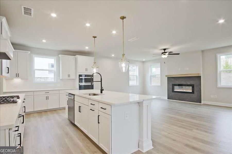 Furnished interior view inside a new home in The Paddocks at Doc Hughes, Buford (Image 14).