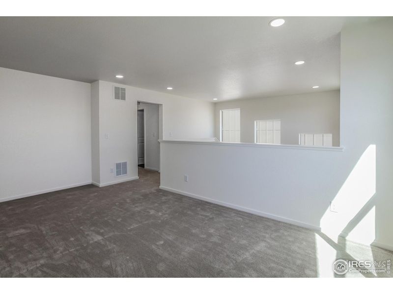 Spacious, unfurnished interior of a new home in Trailside Story Collection - Single Family Homes, Timnath (Image 25).