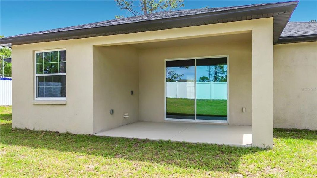 Exterior details and patio area of a home in , Citrus Springs (Image 29).