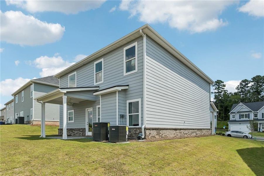 Exterior details and patio area of a home in The Hills at Cedar Creek, Winder (Image 25). Exterior details and patio area of a home in The Hills at Cedar Creek, Winder (Image 25).