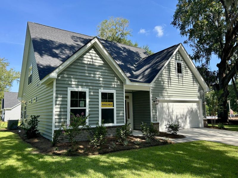 Front exterior of a new home in Academy Park, Beaufort, SC, highlighting curb appeal (Image 2). Front exterior of a new home in Academy Park, Beaufort, SC, highlighting curb appeal (Image 2).