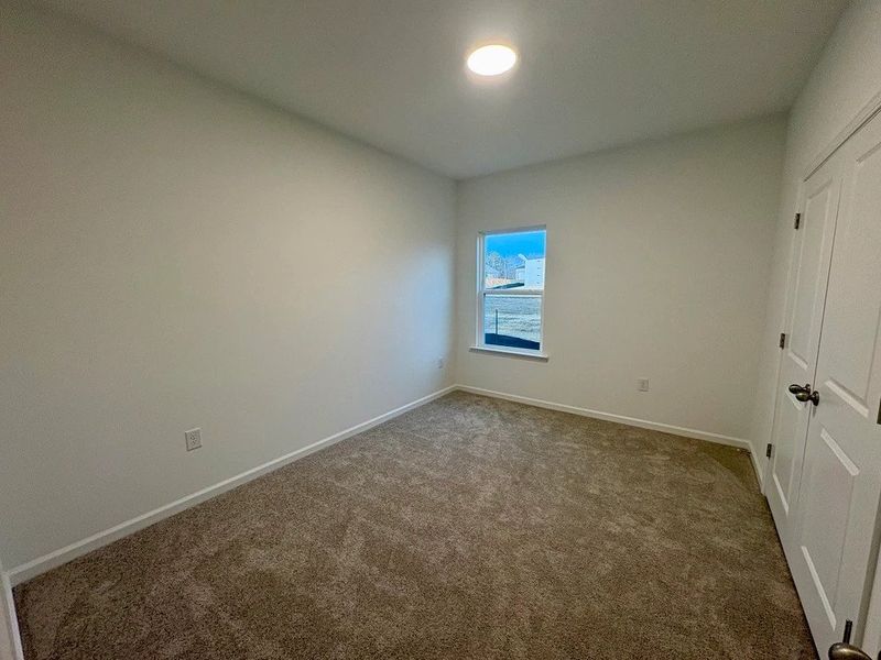 Bed 2 - Neutral tones and clean lines with modern comfort.