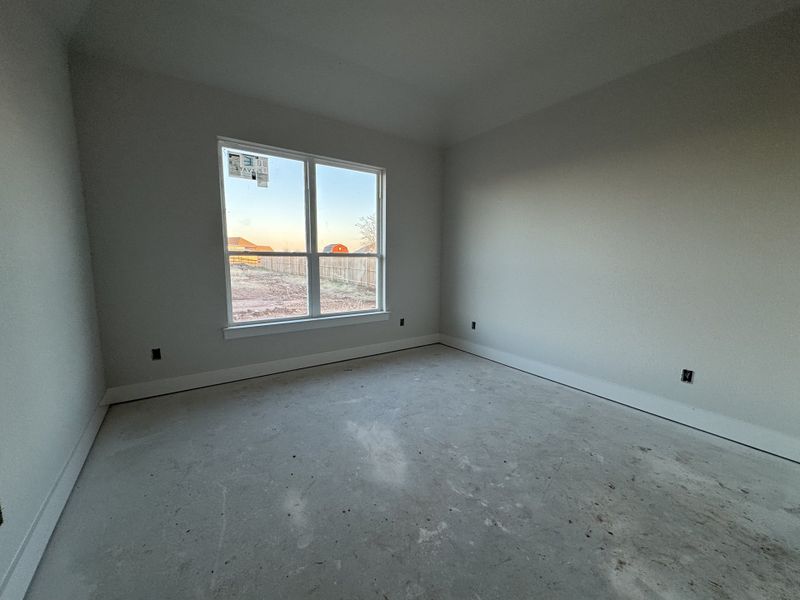 In-progress construction of a new home in Coyote Crossing, Godley, TX (Image 13).