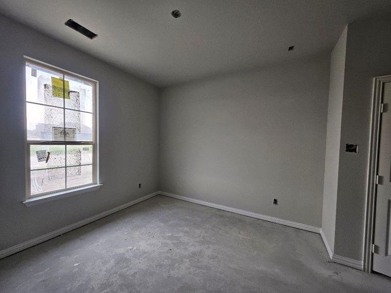 In-progress construction of a new home in The Hollow, Ennis, TX (Image 12).