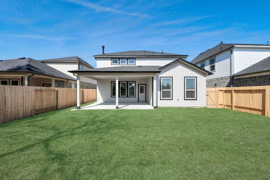 Backyard retreat, offering an abundance of space for kids to play and explore. The possibilities are endless in this outdoor haven, where the joy of open-air activities and family gatherings awaits.