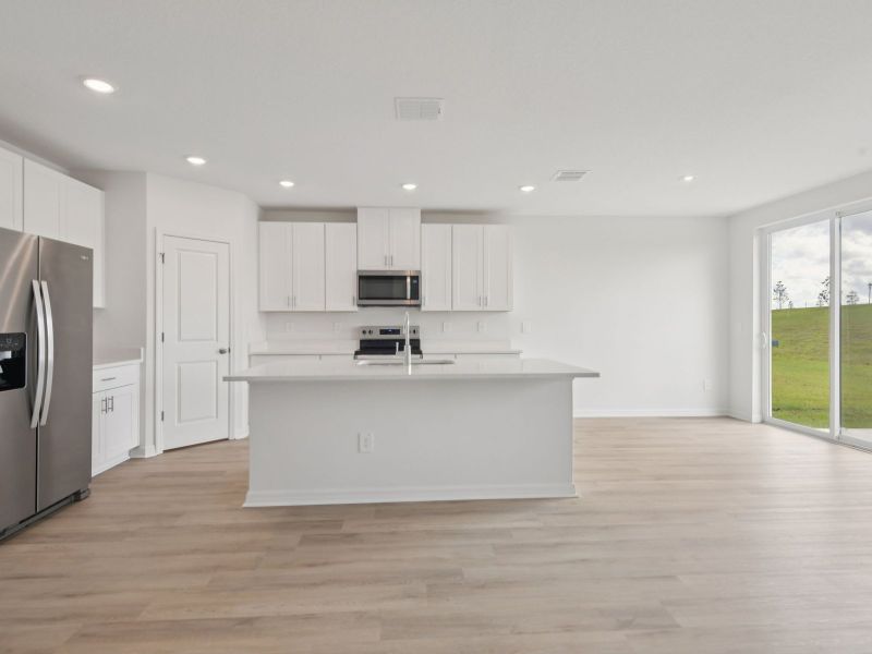 Furnished interior view inside a new home in Hilltop Vistas, Dade City (Image 3).