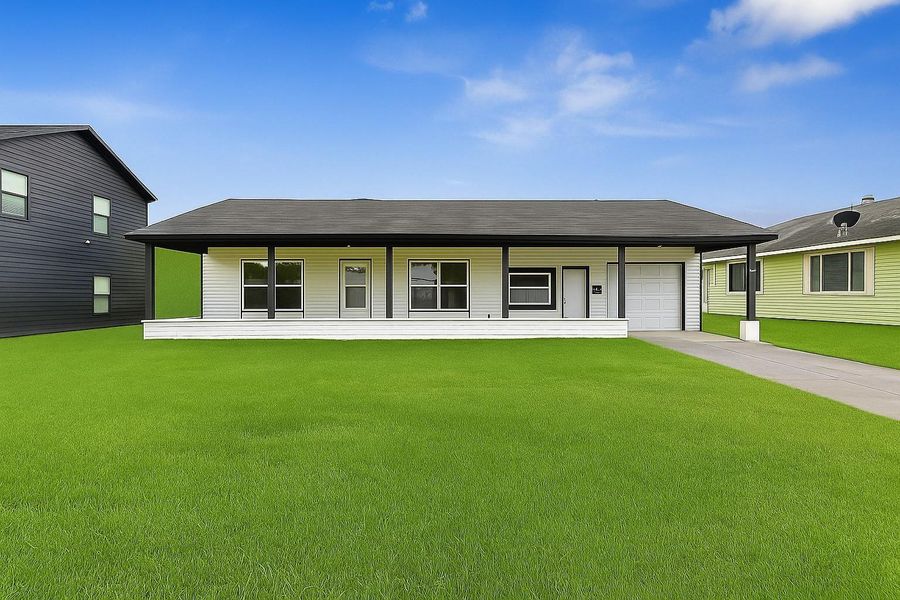 This charming single-story home features a neat front lawn, a driveway leading to a one-car garage, and a welcoming front porch. The exterior is modern with contrasting black and white accents, offering a fresh and updated look.