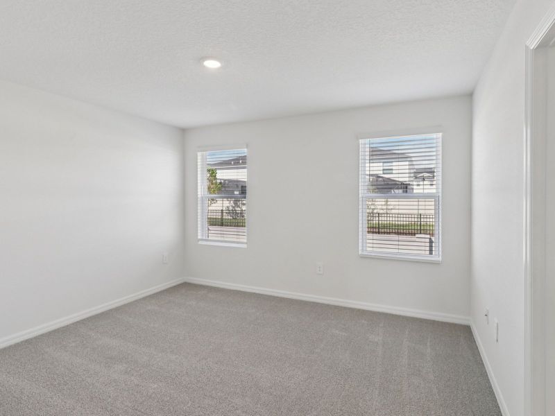 Spacious, unfurnished interior of a new home in Cagan Crossings West, Clermont (Image 11).