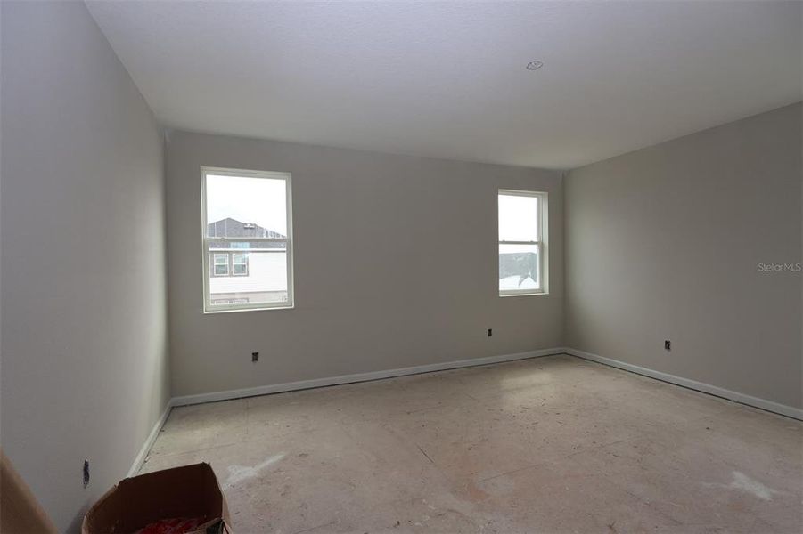 In-progress construction of a new home in Center Lake on the Park, St. Cloud, FL (Image 7).