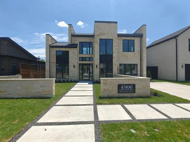 Front exterior of a new home in , Dallas, TX, highlighting curb appeal (Image 1). Front exterior of a new home in , Dallas, TX, highlighting curb appeal (Image 1).