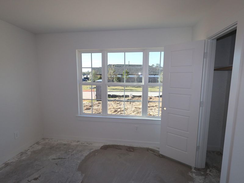 In-progress construction of a new home in Pinewood at Grand Texas, New Caney, TX (Image 21).
