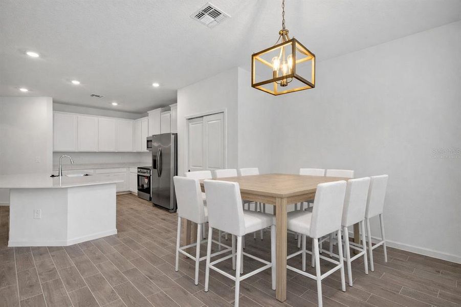 Furnished interior view inside a new home in , Dunnellon (Image 7).