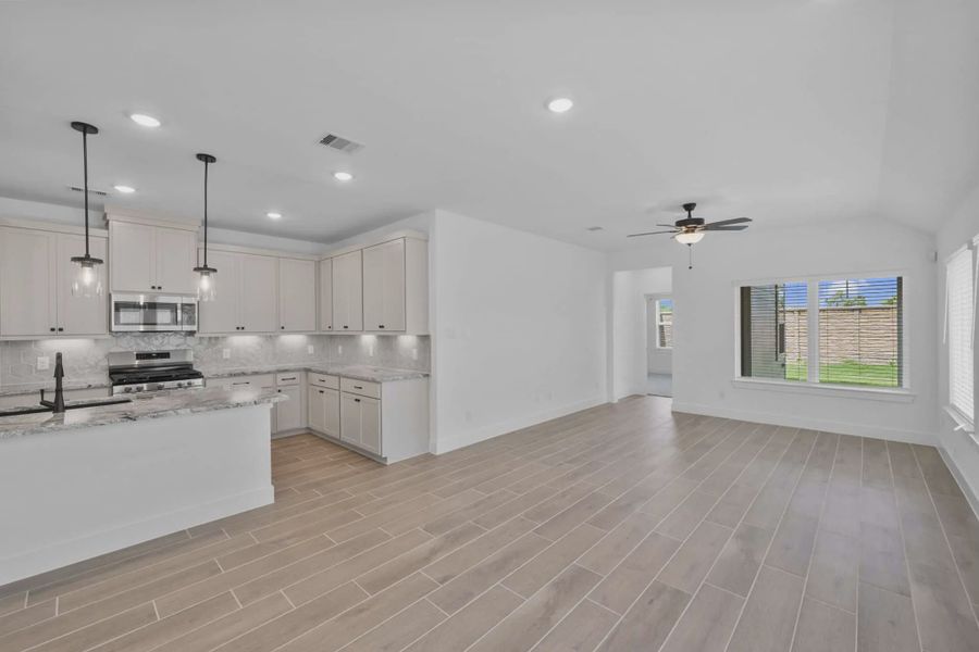 Image 99 representing the Carriagehouse by Chesmar Homes in Meridiana Townhomes, Iowa Colony, TX.