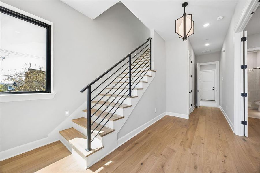 Foyer featuring light wood-style flooring and recessed lighting Foyer featuring light wood-style flooring and recessed lighting