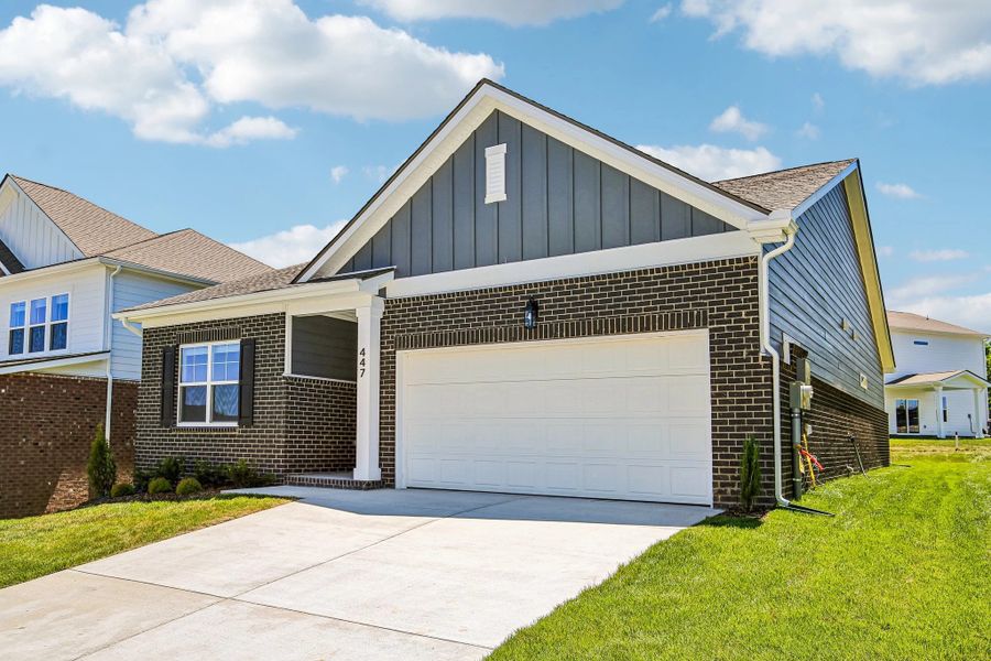Front exterior of a new home in Cades Bluff, Lebanon, TN, highlighting curb appeal (Image 2). Front exterior of a new home in Cades Bluff, Lebanon, TN, highlighting curb appeal (Image 2).