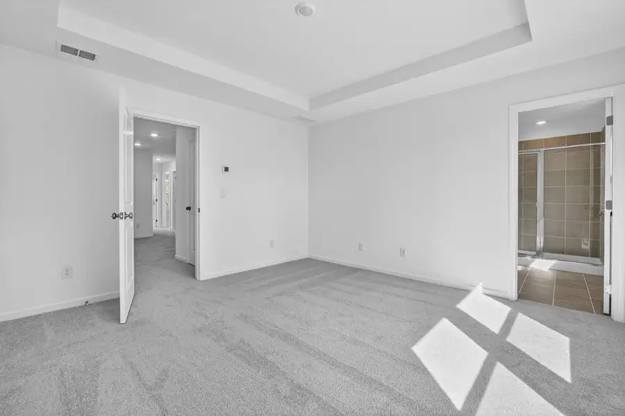 Spacious, unfurnished interior of a new home in Weatherfield, Buford (Image 25).