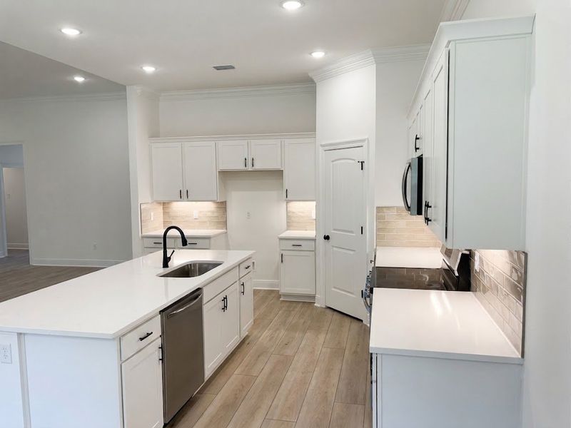 Furnished interior view inside a new home in Young Oaks, Crestview (Image 9).