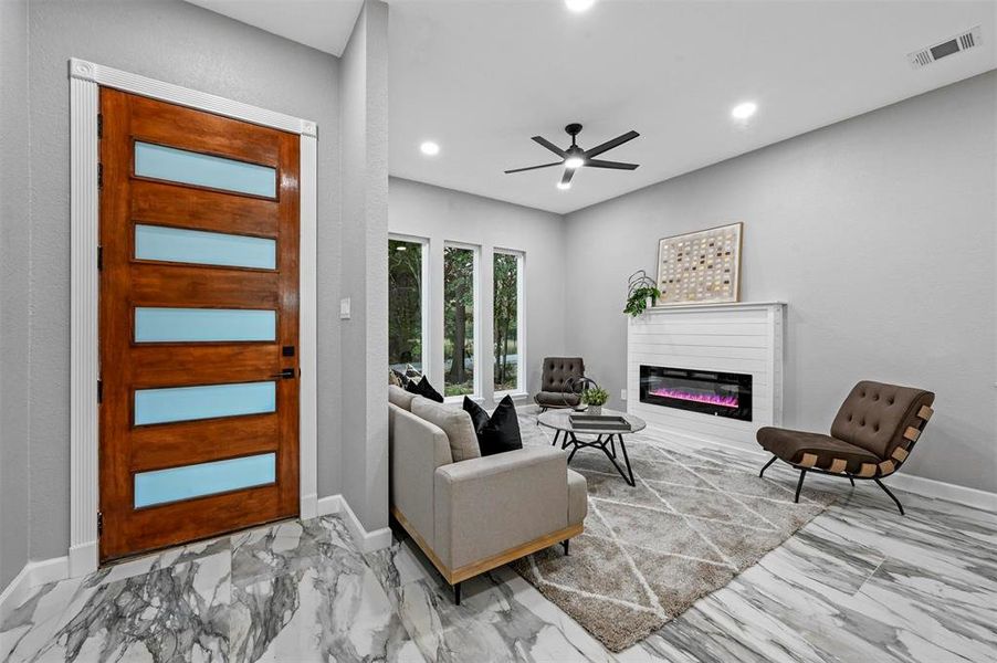 Living room featuring electric fire place