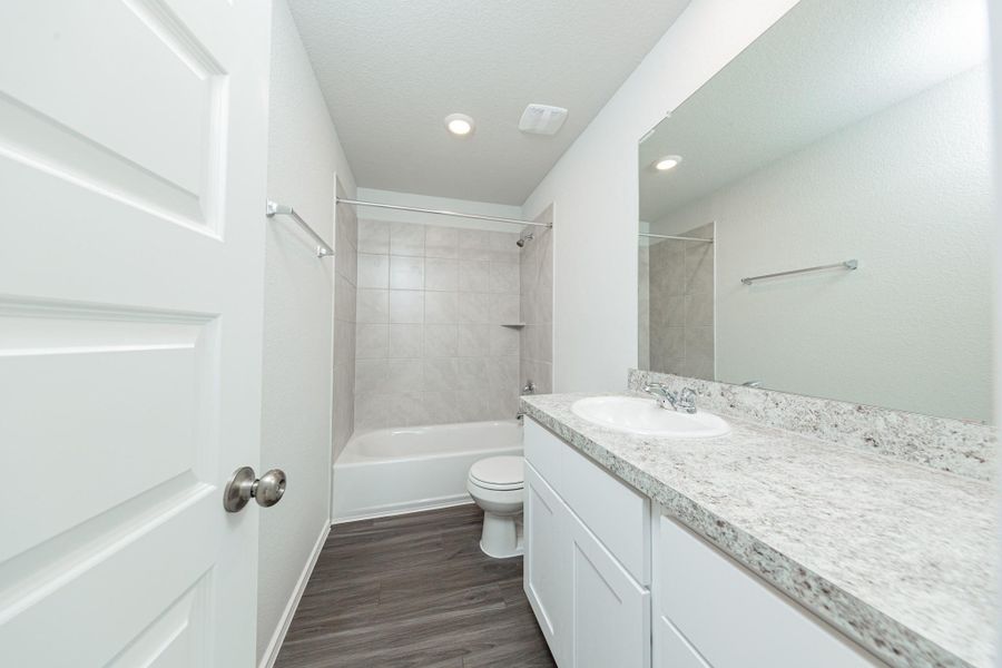 Furnished interior view inside a new home in Townsend Reserve, Splendora (Image 7).