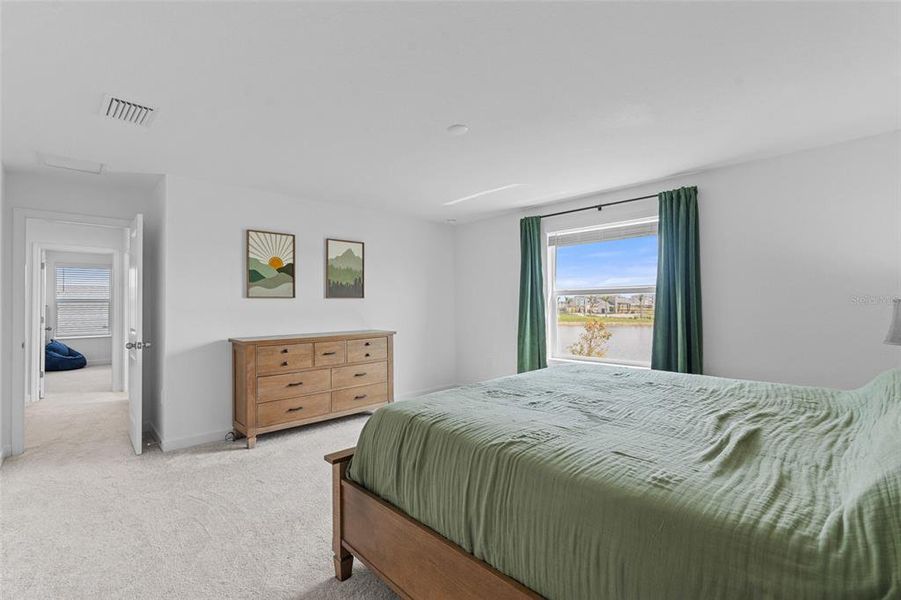 Furnished interior view inside a new home in Tuckers Cove: Villas, Punta Gorda (Image 33).