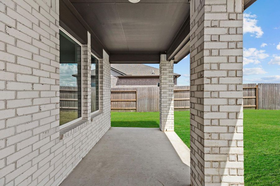 Exterior details and patio area of a home in Sunterra Lakes, Brookshire (Image 3). Exterior details and patio area of a home in Sunterra Lakes, Brookshire (Image 3).