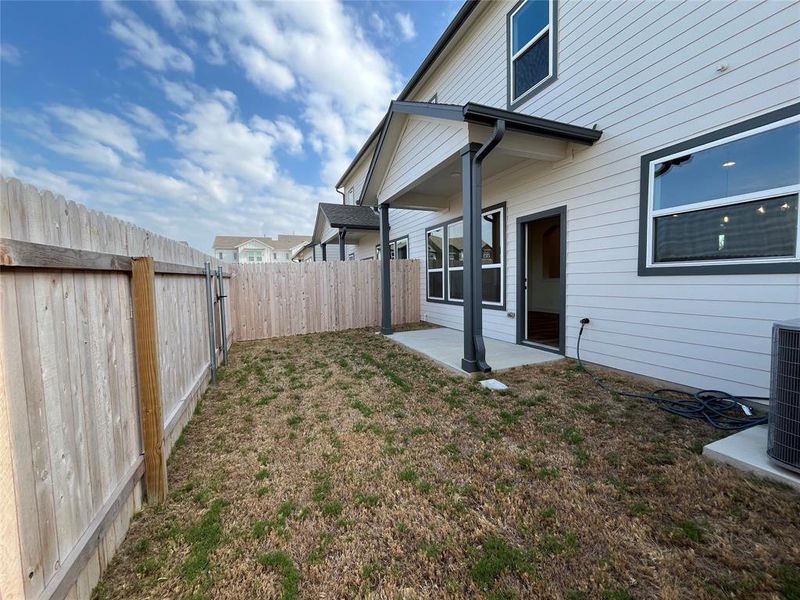 Private fenced in backyard