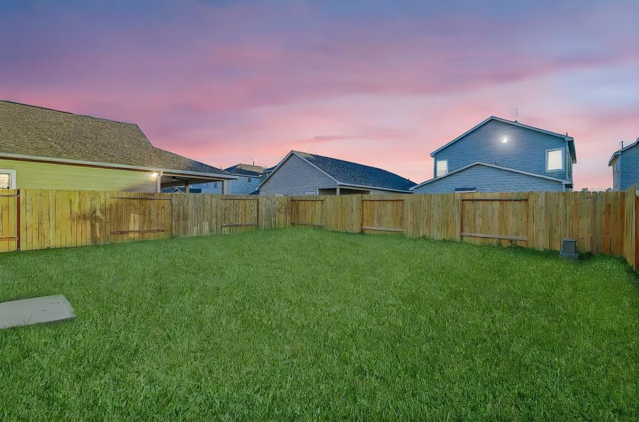 This yard is fully fenced that offers privacy to enjoy the nature or host family gatherings.