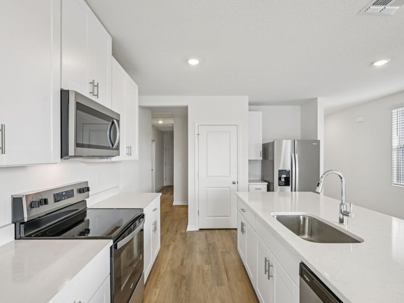 Furnished interior view inside a new home in Salt Meadows - Premier Series, Parrish (Image 4).