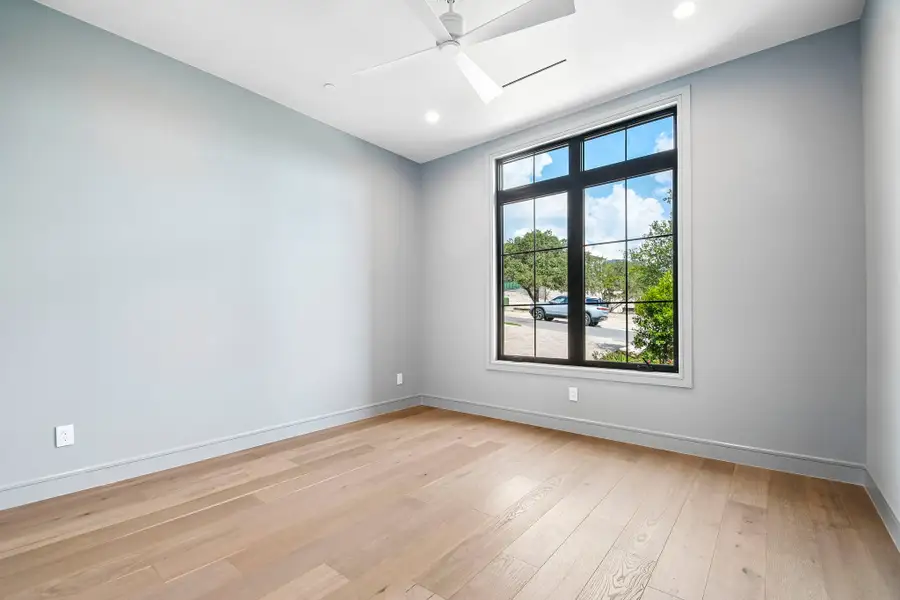 Spacious, unfurnished interior of a new home in The Overlook at Westlake, Austin (Image 22).
