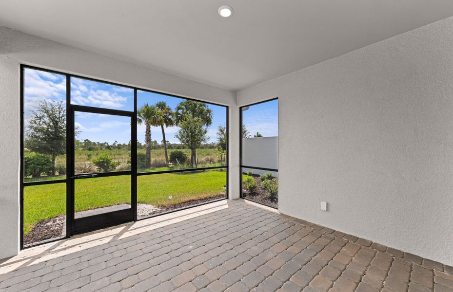 Exterior details and patio area of a home in TerraWalk at Babcock Ranch, Alva (Image 3).