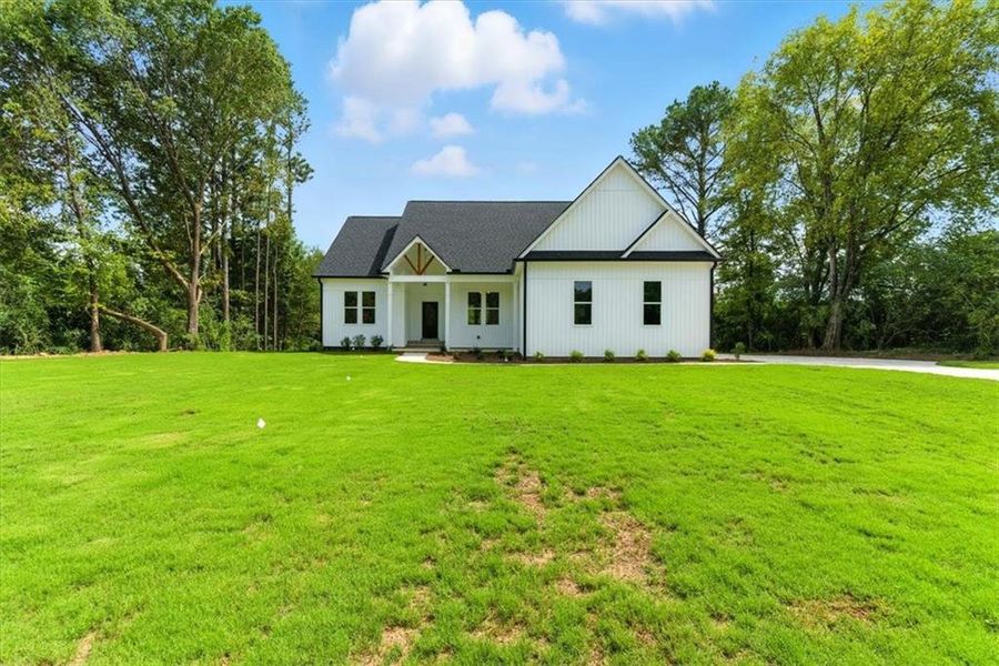 Front exterior of a new home in , Rome, GA, highlighting curb appeal (Image 19).
