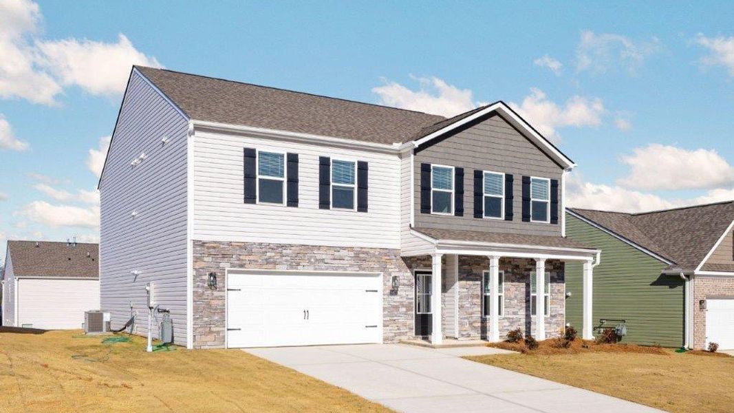 Front exterior of a new home in Sweet Briar, Ooltewah, TN, highlighting curb appeal (Image 2).