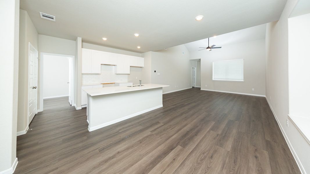 Dining Area to Kitchen and Family Room