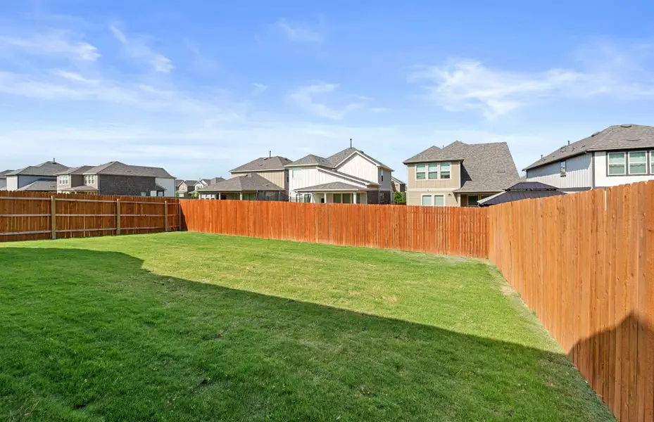 Exterior details and patio area of a home in Saddleback at Santa Rita Ranch, Liberty Hill (Image 2).