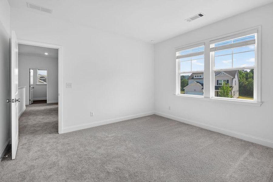 Spacious, unfurnished interior of a new home in Bennett Farm, Loganville (Image 29).