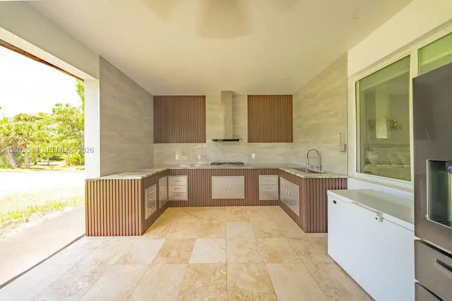 Exterior details and patio area of a home in , North Fort Myers (Image 24).