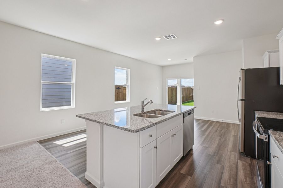 Representative furnished interior of a home built from the Odyssey by Starlight Homes in The Wilder, Adkins (Image 9). Representative furnished interior of a home built from the Odyssey by Starlight Homes in The Wilder, Adkins (Image 9).