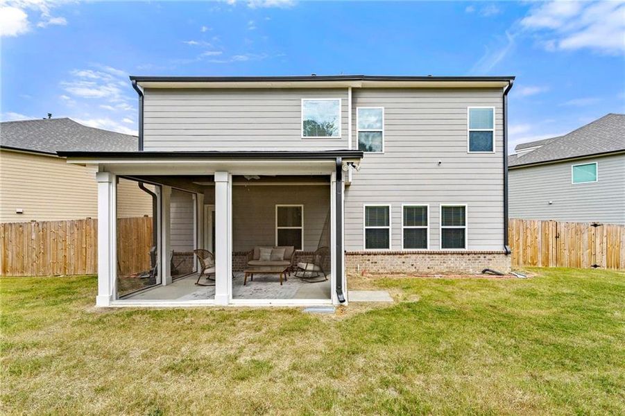 Exterior details and patio area of a home in Westgate Estates, Loganville (Image 16).