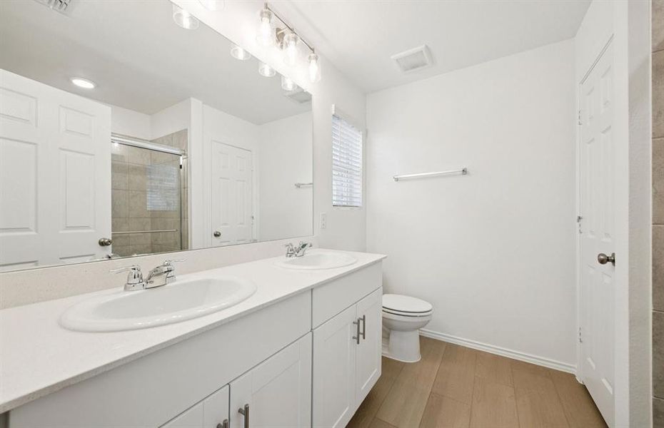 Owner's private bath with double sinks